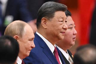 China's President Xi Jinping (C), North Korea's leader Kim Jong Un (R) and Russia's President Vladimir Putin in 2025
